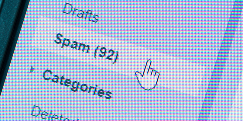 Phone screen showing the mouse hovering over email spam folder